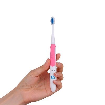 
                Электрическая зубная щетка CS Medica CS-161 (розовая), удобно лежит в руке