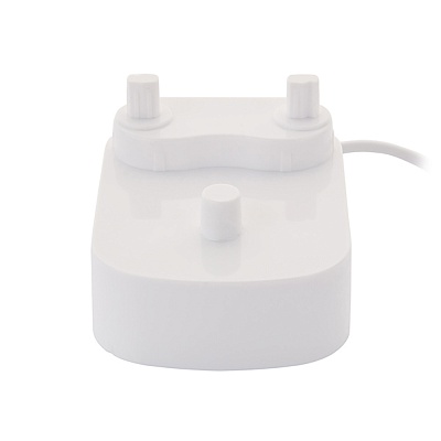 
                Электрическая зубная щетка CS Medica CS-485, зарядка крупным планом